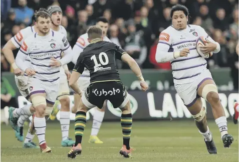  ??  ?? 0 Back row forward Fred Tuilagi charges forward with ball in hand against Northampto­n Saints during his time at Leicester Tigers.