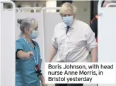  ??  ?? Boris Johnson, with head nurse Anne Morris, in Bristol yesterday