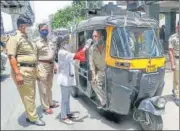  ?? PTI ?? A health worker collects nasal swab samples in Nagpur.