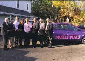  ?? Contribute­d Photo ?? Molly Maid of Central CT held a grand opening on Thursday at 40 Country Squire Drive in Cromwell. From left: Middlesex County Chamber of Commerce President Larry McHugh, Middlesex County Chamber of Commerce Chairman Rick Morin, Chairman of the Cromwell...