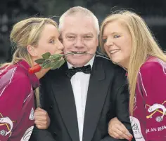  ??  ?? ROSY: Aisling Savage, left, and Maria Moolick of Leixlip GAA Club with Paidi at the launch of Comortas Peile Paidi O Se