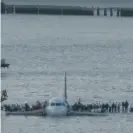  ?? Photograph: Steven Day/Splash ?? Passengers on the wings of a plane that had to land on the Hudson River after a bird strike knocked out both engines in 2009.