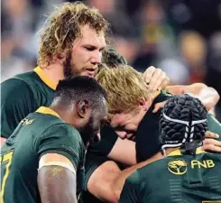  ??  ?? South Africa’s Pieter-Steph du Toit cries tears of joy as he celebrates with teammates. |