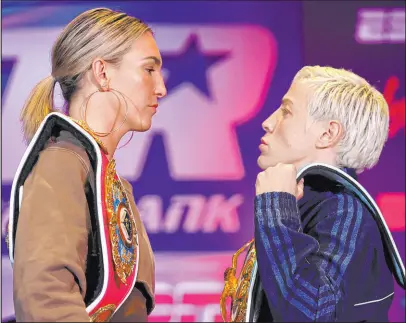  ?? Mikey Williams Top Rank Inc. ?? Mikaela Mayer, left, and Maiva Hamadouche come face to face at a news conference on Wednesday at Virgin Hotels Las Vegas ahead of their upcoming WBO/IBF title fight.