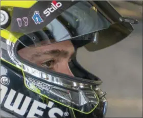  ?? THE ASSOCIATED PRESS ?? Driver Jimmie Johnson looks on during practice for the NASCAR Cup Series auto race at Martinsvil­le Speedway in Martinsvil­le, Va., Saturday.