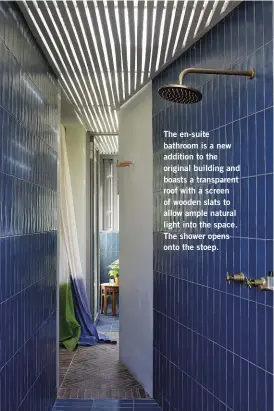  ??  ?? The en-suite bathroom is a new addition to the original building and boasts a transparen­t roof with a screen of wooden slats to allow ample natural light into the space. The shower opens onto the stoep.