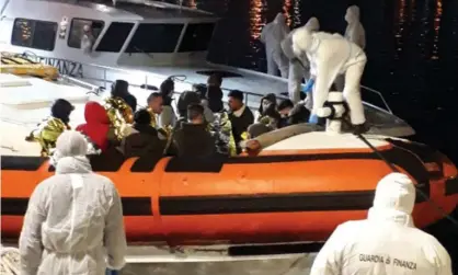  ??  ?? Migrants arriving at the port of Lampedusa, Sicily, last month. Four boats were reported to have been in distress in waters between Malta and Italy at the weekend, with only one so far rescued. Photograph: Red/EPA