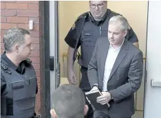  ?? ANDREW VAUGHAN/THE CANADIAN PRESS ?? Dennis Oland heads from court in Fredericto­n in 2016. The Supreme Court of Canada says Dennis Oland was wrongly denied bail pending an appeal of his second-degree murder conviction. The high court decision today could have influence beyond the...