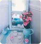  ??  ?? an upcycled mirror by @house_home_love_ family features a pretty Cath Kidston ribbon