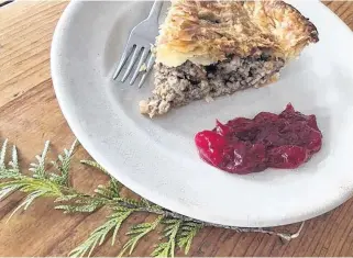  ??  ?? Acadian style turkey and pork tourtiere