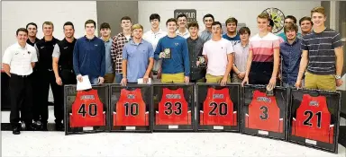  ?? TIMES photograph by Annette Beard ?? Blackhawk Nick Coble, one of the most prolific scores in Pea Ridge history and one of best scorers in Northwest Arkansas, according to coach Trent Lloyd, was named Most Valuable Player during the awards ceremony Tuesday, May 14. Trey Anderson was named Mr. Blackhawk. Seniors received framed jerseys.