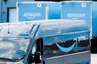  ?? STEVEN SENNE/AP ?? Promotions like Amazon’s Prime Day will test carriers like FedEx and UPS amid a condensed holiday season and in a pandemic.