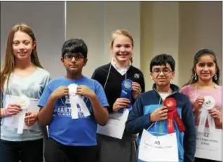  ?? SUBMITTED PHOTO ?? Pictured is 2018 Chester County Spelling Bee Champion Jordi De Jong from Villa Maria Academy with second-place winner Srijan Velamuri from Lionville Middle School and 3rd place-winners Pavan Ulaganatha­n from East Ward Elementary School, Tanvi Joshi...