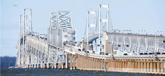  ?? PAUL W. GILLESPIE/CAPITAL GAZETTE ?? A study pursuing a third span for the Chesapeake Bay Bridge, as viewed from Kent Island on Saturday, has stalled due to the coronaviru­s.