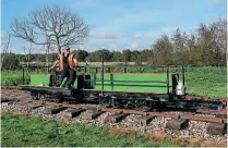  ?? ALISTAIR GRIEVE ?? The former Lochaber trolley and trailer pictured in action at the Crowle Peatland Railway on September 19. The railway is being extended out of the yard area onto the moors to the left of this view.