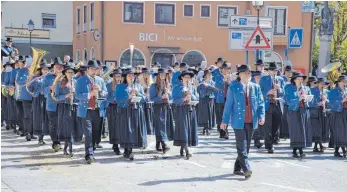  ?? FOTO: MUSIKVEREI­N BAIENFURT ?? Die Musikkapel­le Baienfurt ist seit 1905 bei jedem Weingarten­er Blutritt dabei.