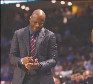  ?? NWA Democrat-Gazette/J.T. WAMPLER ?? TOUGH FINISH: Arkansas head coach Mike Anderson pounds his fist during the second half against North Carolina March 19 during the second round of the NCAA Tournament at the Bon Secours Wellness Arena in Greenville, S.C. With the season over due to the...