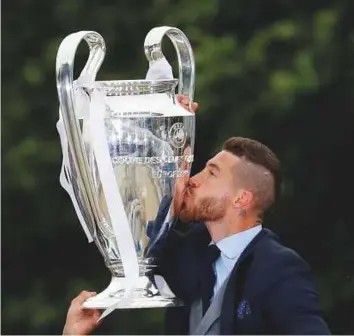  ?? Reuters ?? Sergio Ramos with the Uefa Champions League trophy in Madrid. Ramos is facing a lot of flak for his tackle on Mohammad Salah that put the Liverpool star out of the game.