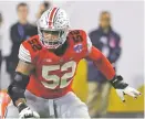  ?? RICK SCUTERI/AP FILE PHOTO ?? Ohio State offensive lineman Wyatt Davis says, 'It’s just a day-to-day thing.'