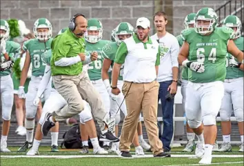  ?? Alexandra Wimley/ Post- Gazette ?? South Fayette coach Joe Rossi, left, has had plenty of reasons to be excited over the years. His team has won 64 consecutiv­e conference games and is only five wins from a WPIAL record.