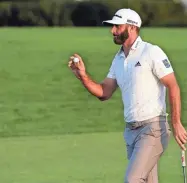  ?? ROB SCHUMACHER-USA TODAY SPORTS ?? Dustin Johnson waves after putting out on the 18th green.