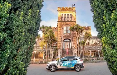  ??  ?? The oldest castle in New Zealand with one of the latest electric cars.