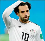  ?? AFP ?? Mohamed Salah of Egypt reacts during the match against Russia at the Saint Petersburg Stadium on Tuesday. —