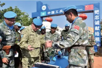  ??  ?? Carlos Humberto Loitey (second left), UN Military Adviser for Peacekeepi­ng Operations, visits the camp of Chinese peacekeepe­rs in Al Fashir, Sudan, on February 7