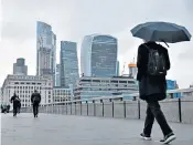  ?? ?? Commuters heading into the City of London at the start of the year. The sandwich chain Pret a Manger is still finding demand on Fridays is 80pc lower than the middle of the week