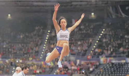  ??  ?? Katarina Johnson-thompson competes in the long jump on her way to winning pentathlon gold at the world indoor championsh­ips.