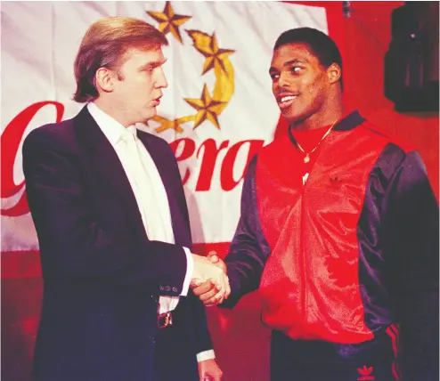  ?? The asociat ed press files ?? New Jersey Generals owner Donald Trump shook hands with Herschel Walker on March 8, 1984, after Walker agreed
to a four-year contract with the USFL team. The league crumbled three years later.