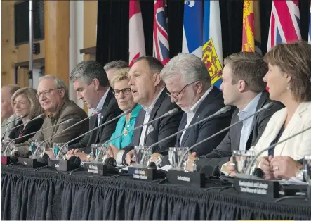  ?? JONATHAN HAYWARD/ THE CANADIAN PRESS ?? Canada’s premiers, pictured in Whitehorse, at the close of their annual conference on Friday, now have an agreement-in-principle on a new interprovi­ncial trade deal.