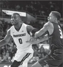  ?? File photo by Louriann Mardo-Zayat / lmzartwork­s.com ?? Ben Bentil (0) and the Providence College men’s basketball team dropped five spots in the AP top 25 poll after Saturday night’s home loss to Seton Hall.