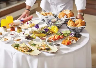  ?? (Afik Gabai) ?? A SUMPTUOUS breakfast is served at the Zaffran Restaurant.