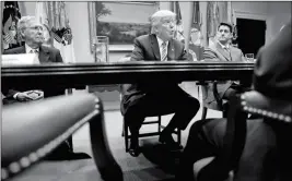  ?? ASSOCIATED PRESS ?? IN THIS JUNE 6 FILE PHOTO, PRESIDENT DONALD TRUMP, flanked by Senate Majority Leader Mitch McConnell of Ky., (left) and House Speaker Paul Ryan of Wis., speaks in the Roosevelt Room of the White House in Washington. President Donald Trump resumed his...