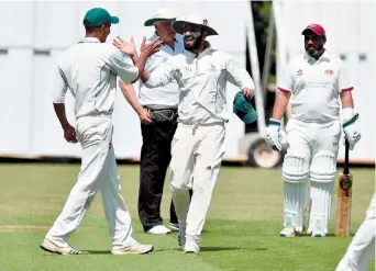  ?? ?? Boyne Hill celebrate a wicket in Saturday's five-wicket win at Cookham Dean.