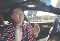  ?? (Jane Lanhee Lee/Reuters) ?? NULLMAX CEO Lei Xu drives a Lincoln MKZ sedan equipped with his company’s prototype self-driving hardware and software in Fremont, California, earlier this month.