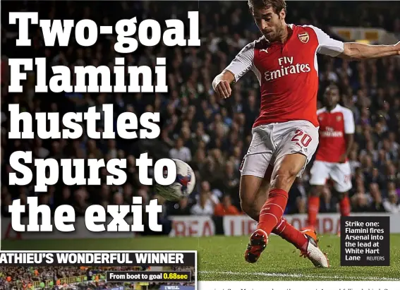  ?? REUTERS ?? Strike one: Flamini fires Arsenal into the lead at White Hart Lane