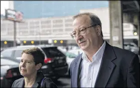  ?? BRANDEN CAMP / SPECIAL ?? Charles P. Richards Jr. (right), a contractor who is accused of conspiracy to commit bribery in order to obtain city of Atlanta contracts, leaves the U.S. District Court with his attorney, Lynne Borsuk, on Wednesday in Atlanta.