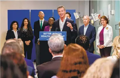  ?? ADRIANA HELDIZ U-T ?? At Alvarado Hospital on Sunday, Gov. Gavin Newsom proposed a ballot initiative to improve mental health services statewide.