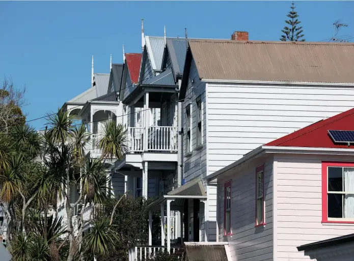  ?? ?? HOUSES IN PONSONBY, AUCKLAND. THE SUBURB'S AVERAGE PROPERTY VALUE HAS DROPPED 2.8% IN THE LAST 12 MONTHS. PHOTO / FIONA GOODALL