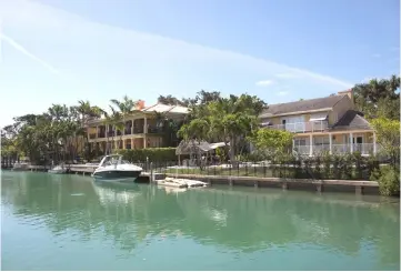  ?? — WP-Bloomberg photo by Alicia Vera. ?? Residentia­l homes sit along the water in Key Biscayne, Florida, on April 19.