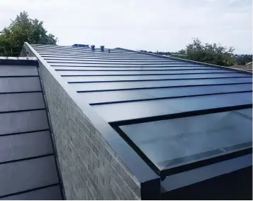  ??  ?? ABOVE: Tractile’s CEO Jason Perkins says a great example of the Eclipse Solar PV tile in use is on a beautiful new family home in Strathmore, Victoria, designed by award winning architect Michael Ong.