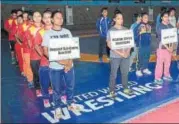  ?? SAI ?? Weightlift­ers from different centres of the Sports Authority of India pose at the opening ceremony of the AllIndia InterSAI Championsh­ip in Lucknow on Thursday.