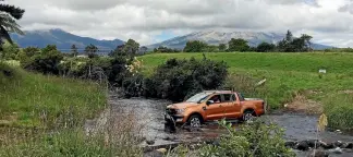  ??  ?? The 4WD trek includes several pretty river crossings.