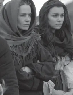  ?? ROADSIDE ATTRACTION­S, THE ASSOCIATED PRESS ?? From left, Valeria Hodos and Samantha Barks in a scene from the film, Bitter Harvest.