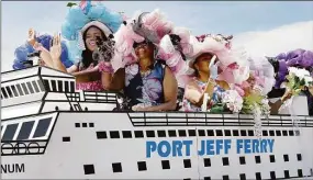  ?? Hearst Connecticu­t Media file photo ?? Women in their Sunday finest ride a float representi­mg the Port Jefferson Ferry in 29th Juneteenth Parade circling through Seaside Park in Bridgeport last year. Since George Floyd’s death, Juneteenth awareness has increased in Connecticu­t, with new school curriculum, advocacy and town festivals.