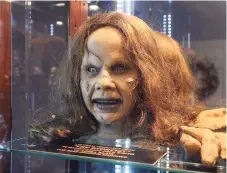  ?? ?? Among the memorabili­a at the Witch's Dungeon: An original head piece of Linda Blair’s Regan MacNeil character used during the filming 1973’s “The Exorcist.”