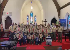  ?? MEDIANEWS GROUP ?? Members of the newly merged Boy Scout Troop 595gather for a service Sunday at St. Gabriel’s Episcopal Church, Douglassvi­lle.