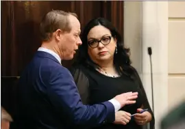  ?? KRISTIN MURPHY — THE DESERET NEWS VIA AP, FILE ?? Sen. Keith Grover, R-provo, talks to Senate Minority Leader Luz Escamilla, D-salt Lake City, before the Senate voted to pass HB261, Equal Opportunit­y Initiative­s, in the Senate chamber at the Capitol in Salt Lake City on Thursday, Jan. 25, 2024.e.